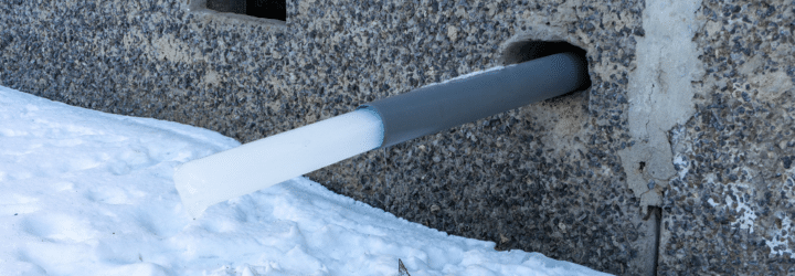 A water pipe in a house with a frozen piece of ice. rainwater harvesting - How seasonal changes can affect sewer lines
