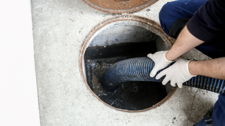 Emptying a household septic tank on a street